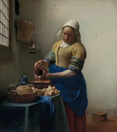 Vermeer's The Milkmaid with a rule of thirds grid, the figure aligned to the left third — a rule of thirds in art example
