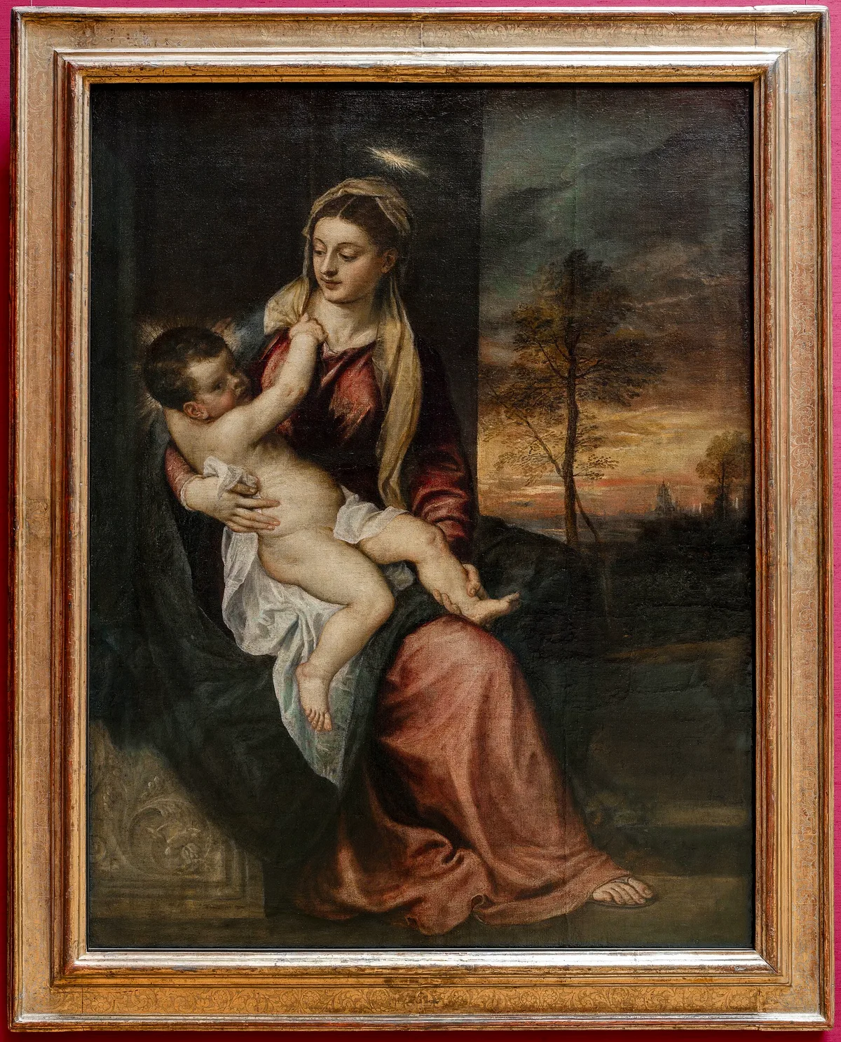 Titian painting showing warm-lit figures set against a darkening evening sky — a clear example of value contrast in oil painting